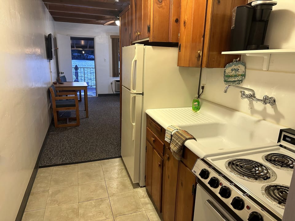 Each suite of the home has a kitchenette & private door to riverfront.