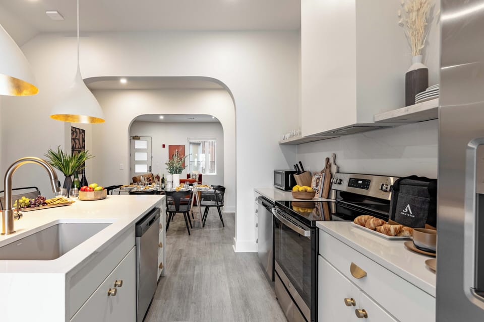 Stainless steel appliances in the kitchen.