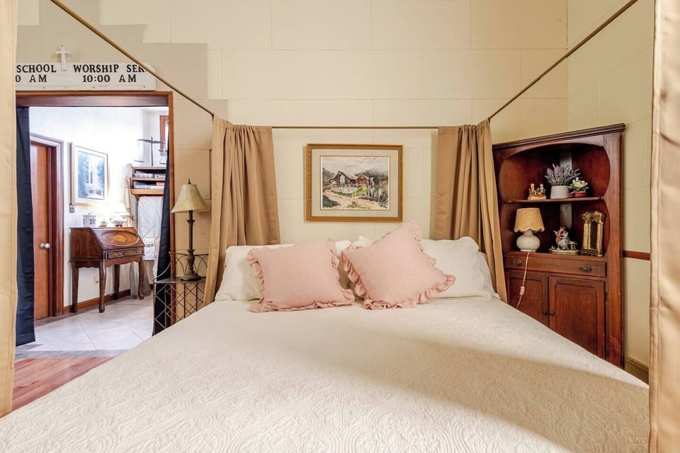 King bed is next to anteroom.  Drapes can be closed to make a dressing room.