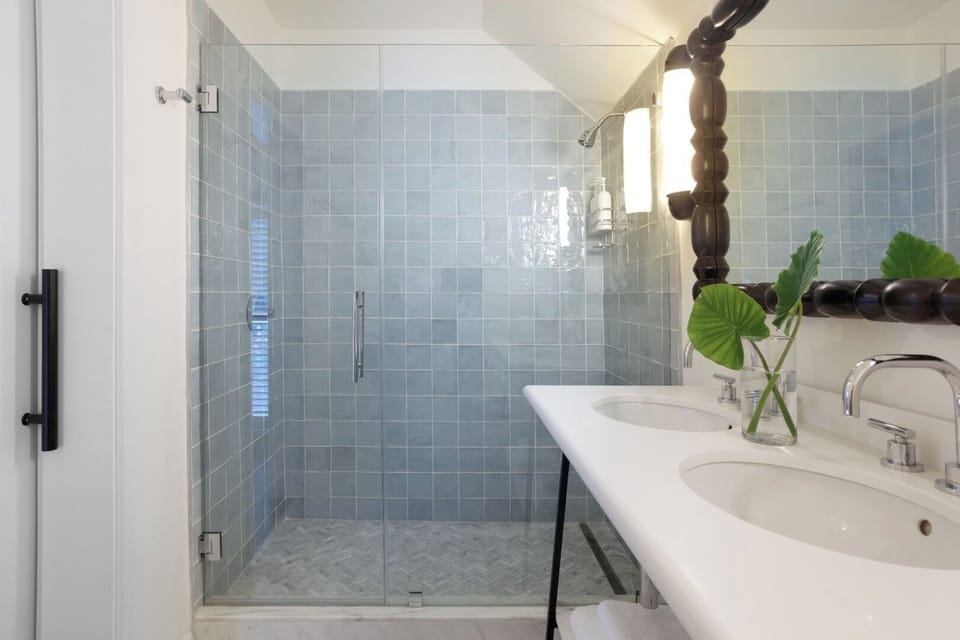 Refresh in a spa-like walk-in shower with double vanity.