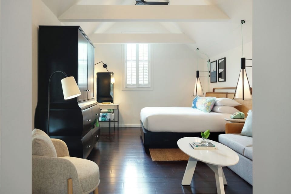 Wake up in a sunlit loft room with thoughtful details.