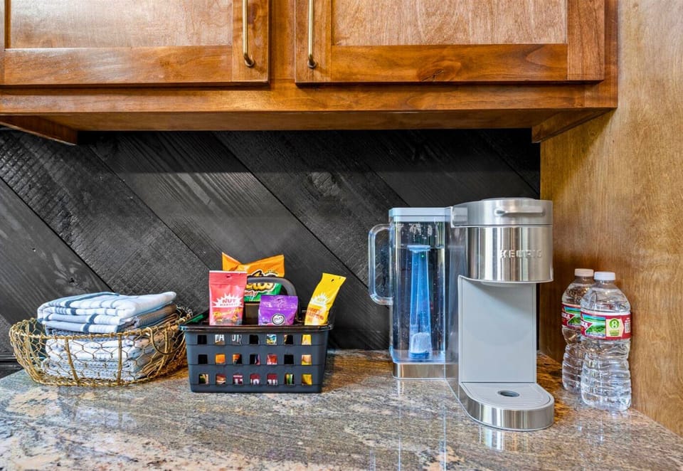 Grab a snack or brew a fresh cup of coffee. This kitchen has it all!