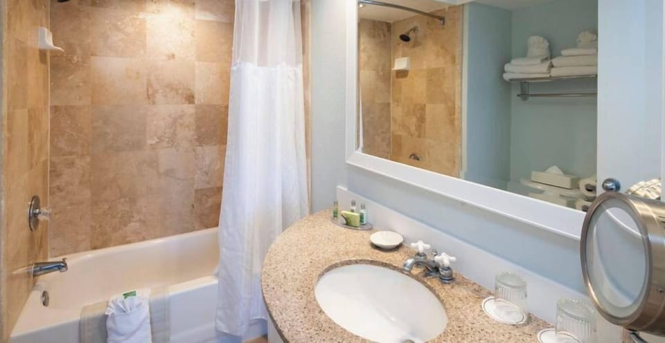 Refresh after the beach in a bright, spa-like bath.