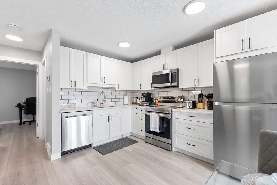 Fully renovated stocked kitchen with brand new stainless steel appliances 