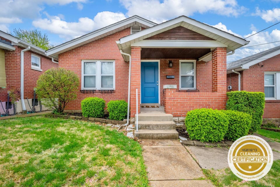 Welcome to our cozy retreat! 🏡💙 Step into our small brick house with a charming blue door and be greeted by the lush green lawn. 🌿✨ It's the perfect place for guests to unwind and create unforgettable memories.