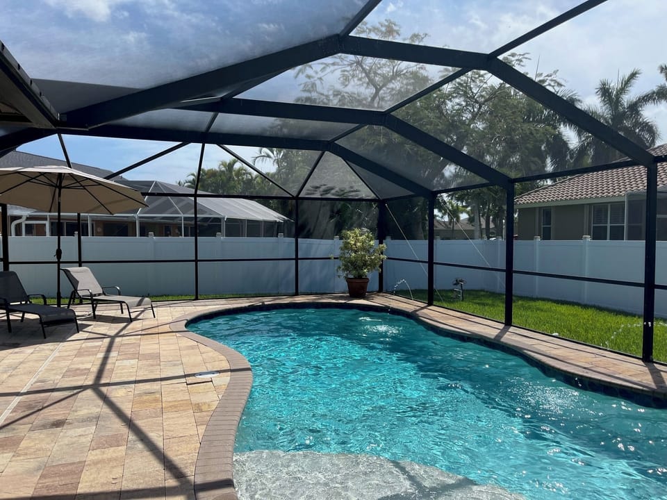Oversized, heated (88), salt water pool with water features, large pool deck.