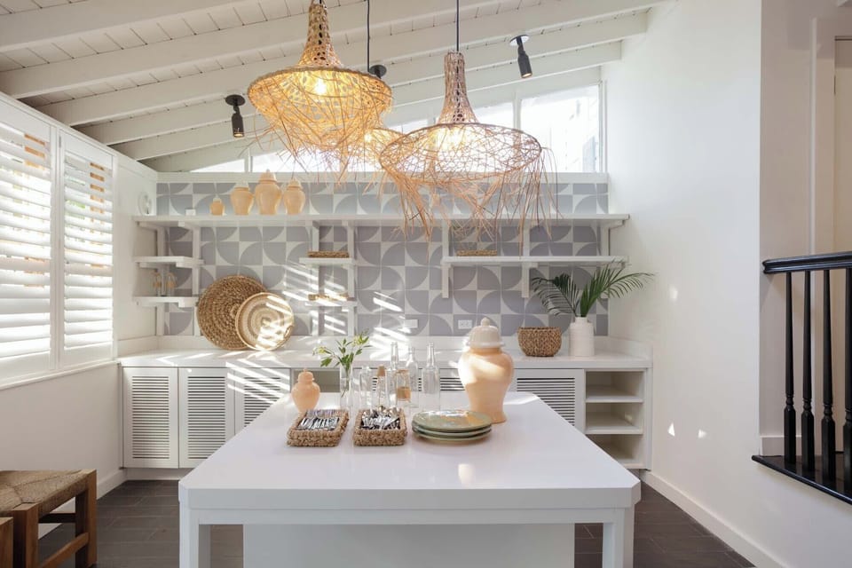 Enjoy sun-dappled mornings in a calm, design-forward dining space.