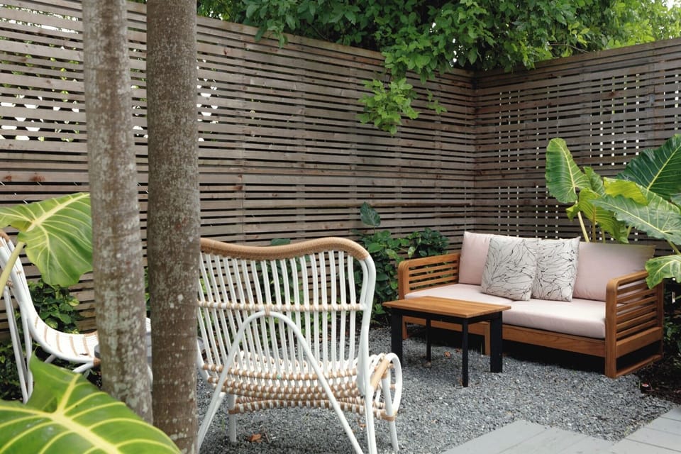 Breathe in tropical calm while lounging in the hidden courtyard.