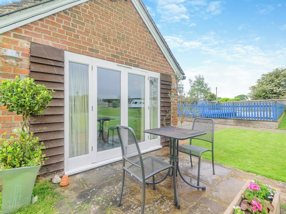 Sitting-out-area | Lidsey Farmhouse, Bognor Regis