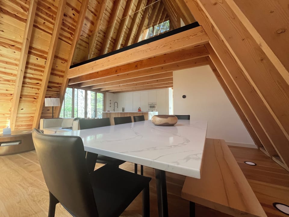 View from dining area to deck exit and loft