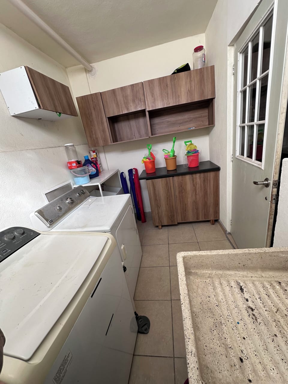 Service Room with Full Washer & Dryer