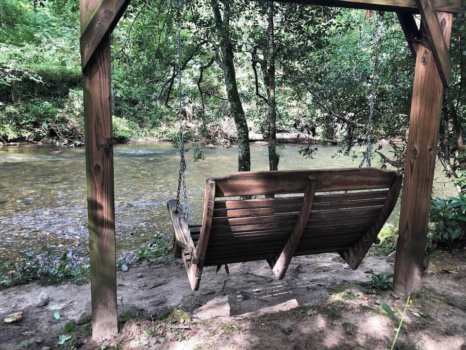 Swing behind the Cabin, next to the Snowbird Creek...great place to unwind.