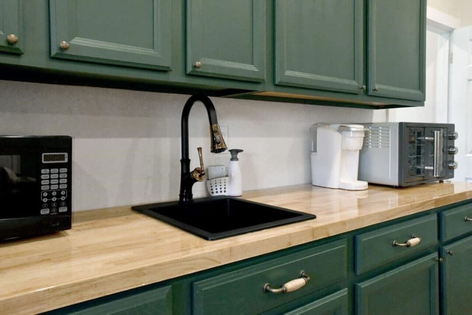 Kitchenette, sink and countertop area for meal prep & cooking!