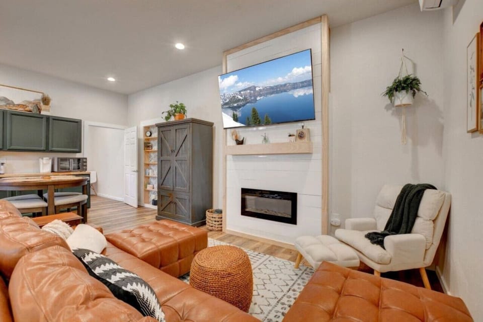 Main lounging area, looking toward dining area and door to additional bedroom.