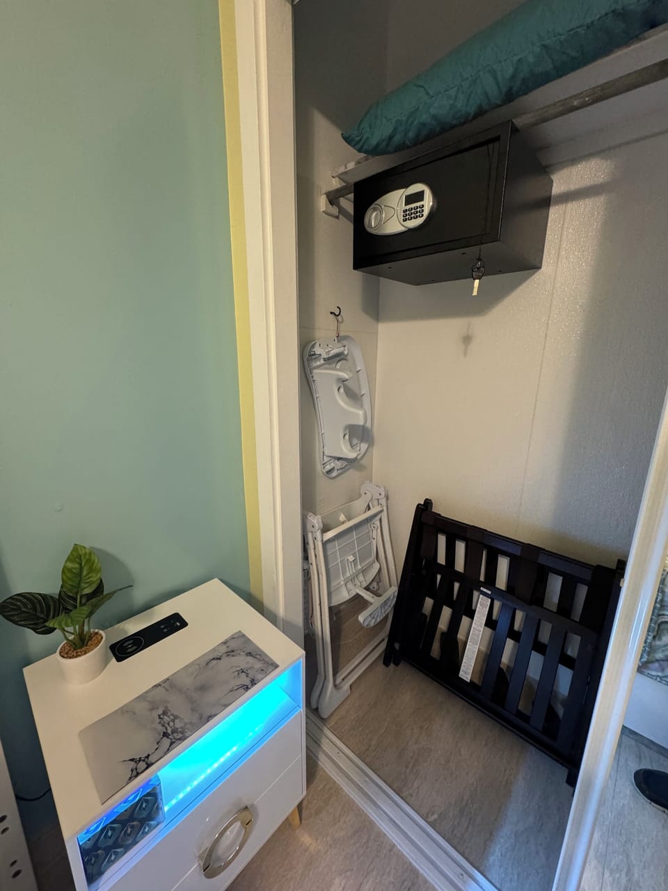 Bedroom 1 has safe box, 65 in TV, nightstand, ion board, baby high chair…