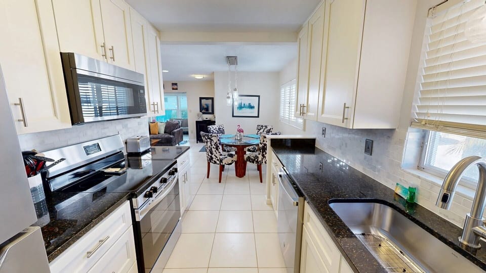 Kitchen is fully stocked for all your cooking needs.