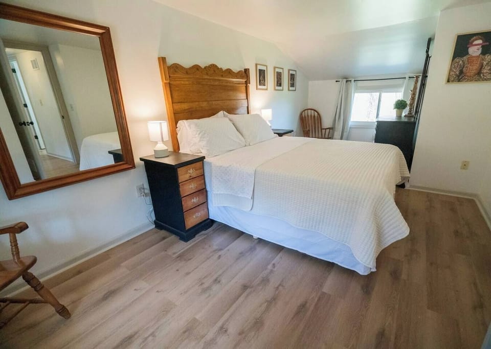 master bedroom with queen bed located upstairs