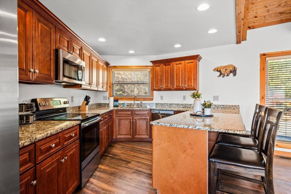 The kitchen is fully stocked and comes with everything you need to prepare meals, enjoy takeout, or have a picnic on the deck.