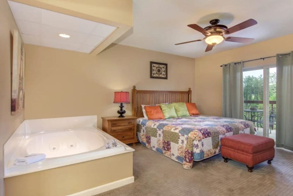 3 Bedroom Pigeon Forge Vacation Condo Rental on River near Dolly - Primary Bedroom with King Bed, Private Bathroom, Cable TV and Wifi