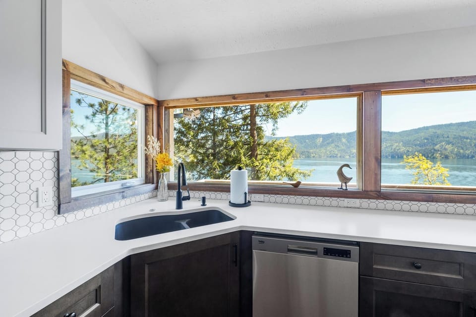 Spacious, fully stocked with island, bar seating, and ample storage (East Wing).