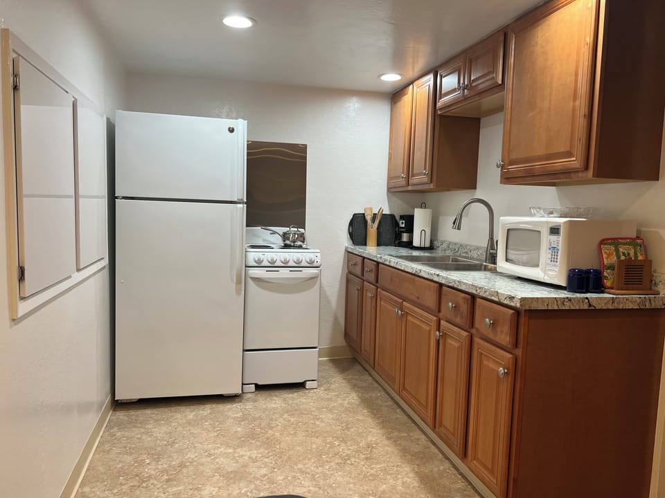 New stove/oven
New stainless sink and faucet.