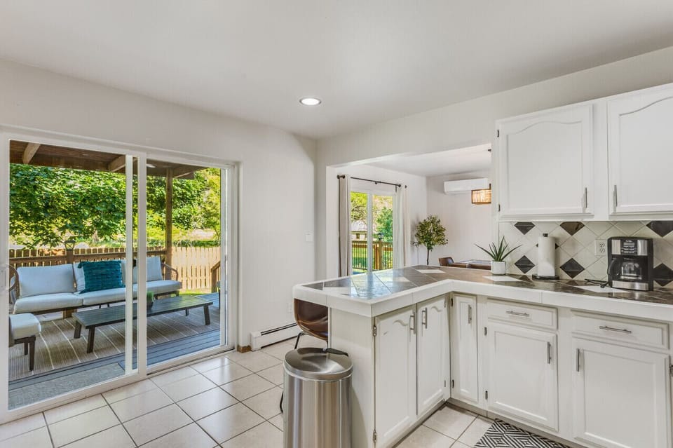 Kitchen w sliding door to back deck