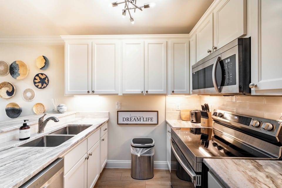 Cook your favorite meals in this stocked kitchen w/ stovetop, oven, & microwave.