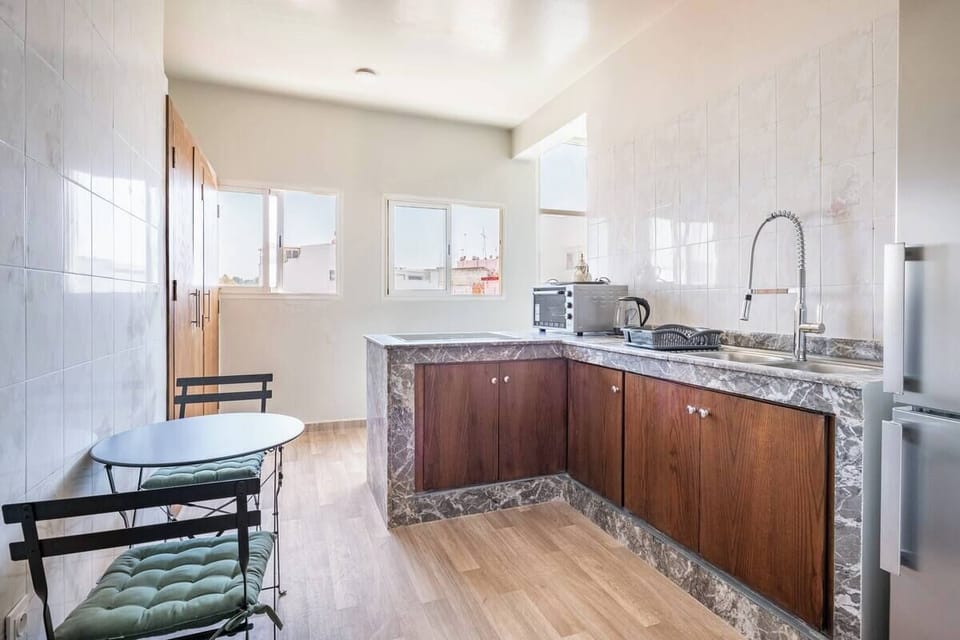 Fully equipped, sunny kitchen with all new appliances and induction stove.