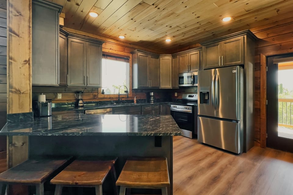 Fully stocked kitchen to stay in and cook together.  Stainless steel appliances.