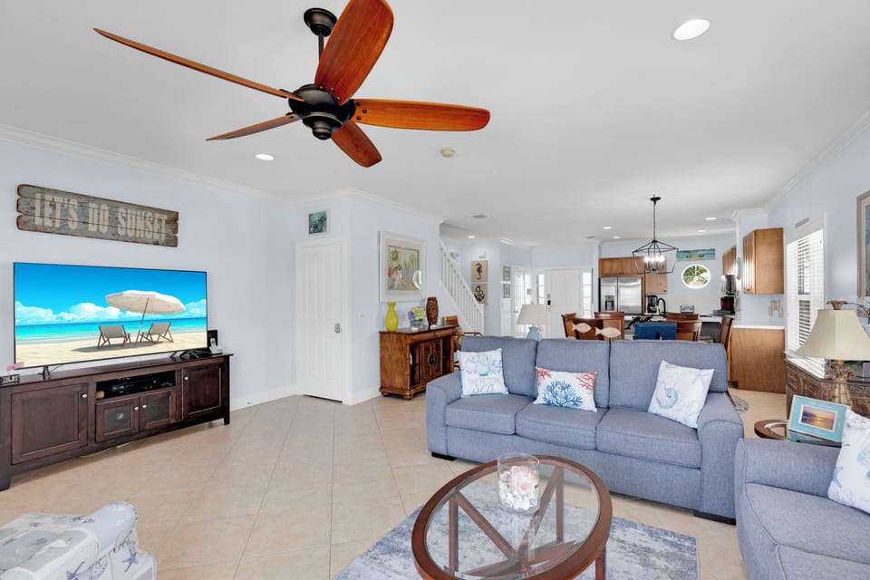 Living room w/ 65" smart tv.