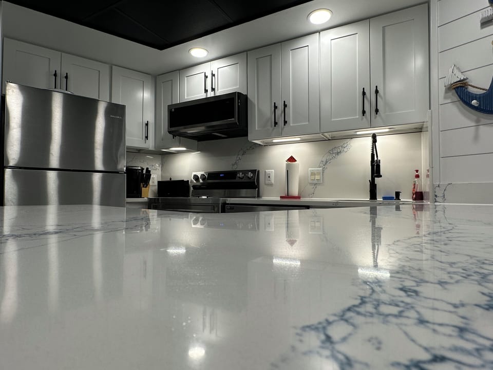 Newly renovated kitchen with bright lighting