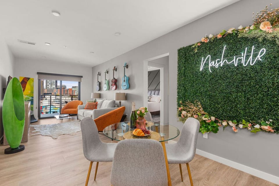 Large living space with everything you can possibly need: umbrellas, yoga mats, dining area, open kitchen, living room with sleeper sofa, access to private balcony, etc