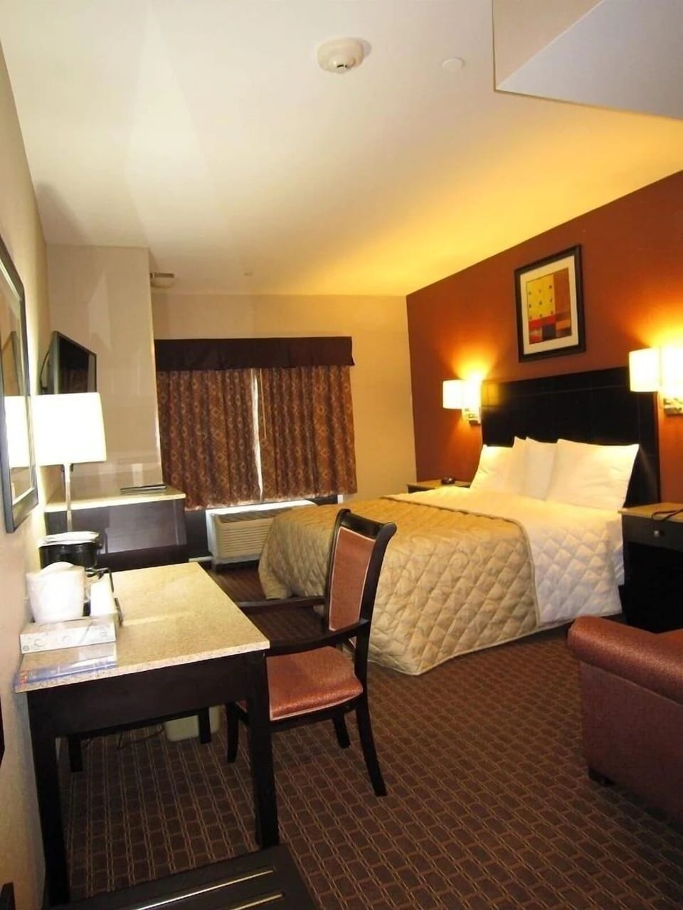 Settle in with extra space, desk comfort, and warm lighting.