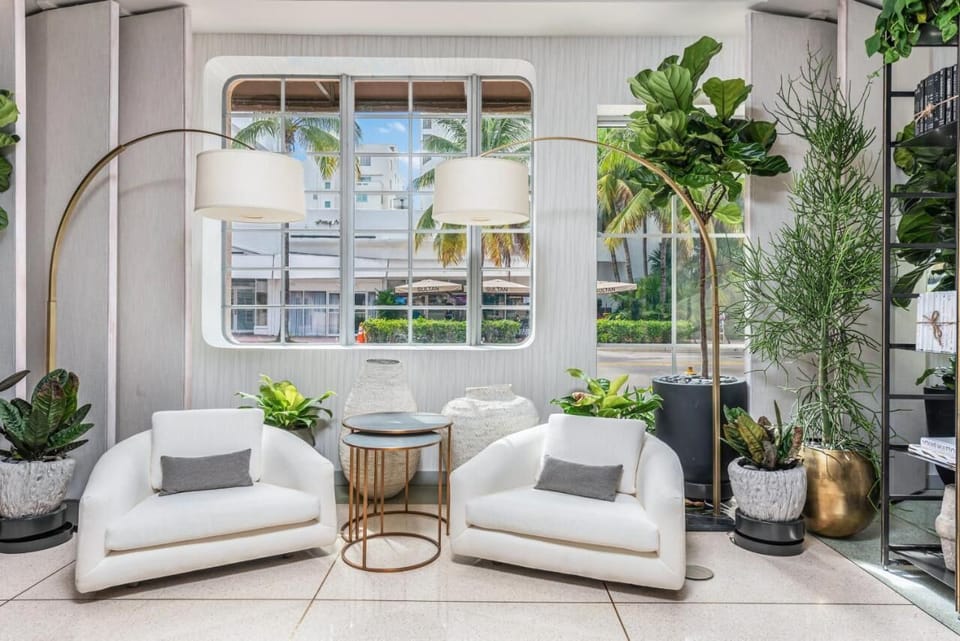 Stretch out on soft sofas and watch palms sway outside.