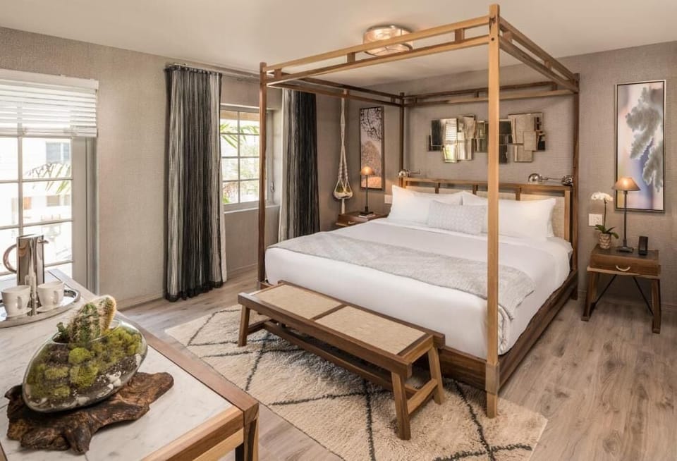 Sink into a luxurious canopy bed for deep, quiet sleep.