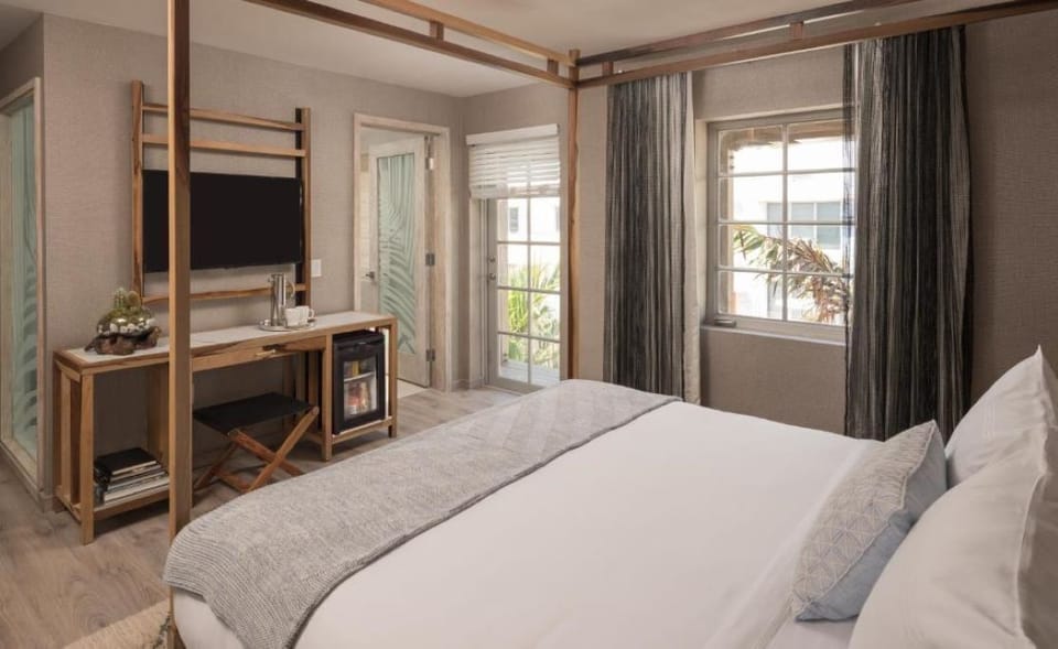 Settle in comfortably with workspace, minibar, and easy room flow