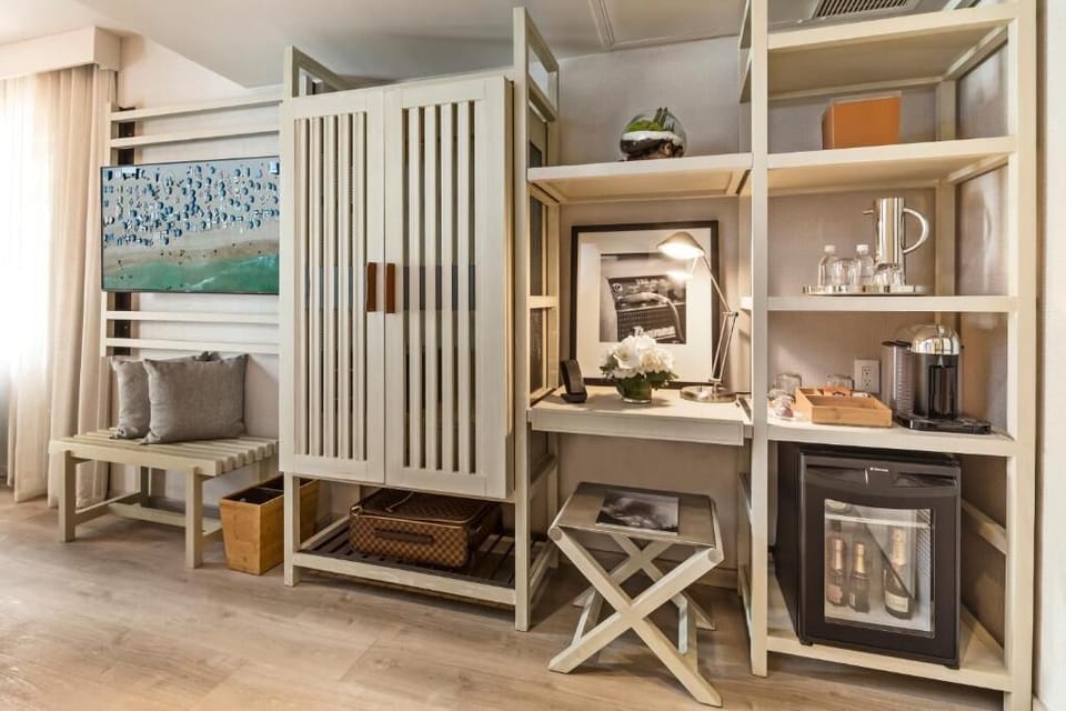 Enjoy in-room refreshments and an easy workspace for quick tasks.