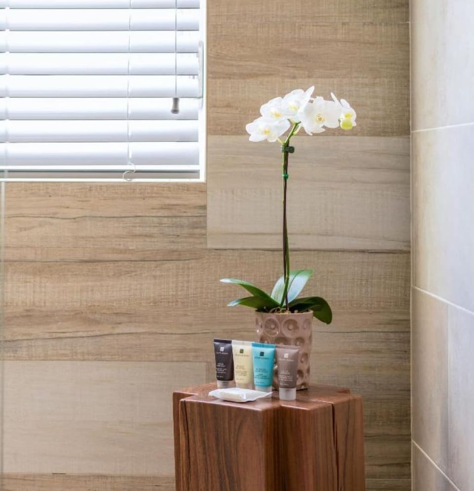Indulge with thoughtful toiletries and fresh blooms, spa-style.