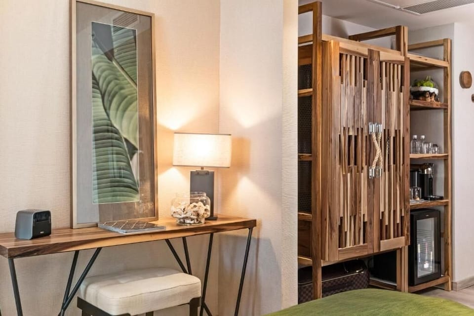 Settle in with a cozy desk and convenient in-room refreshments.