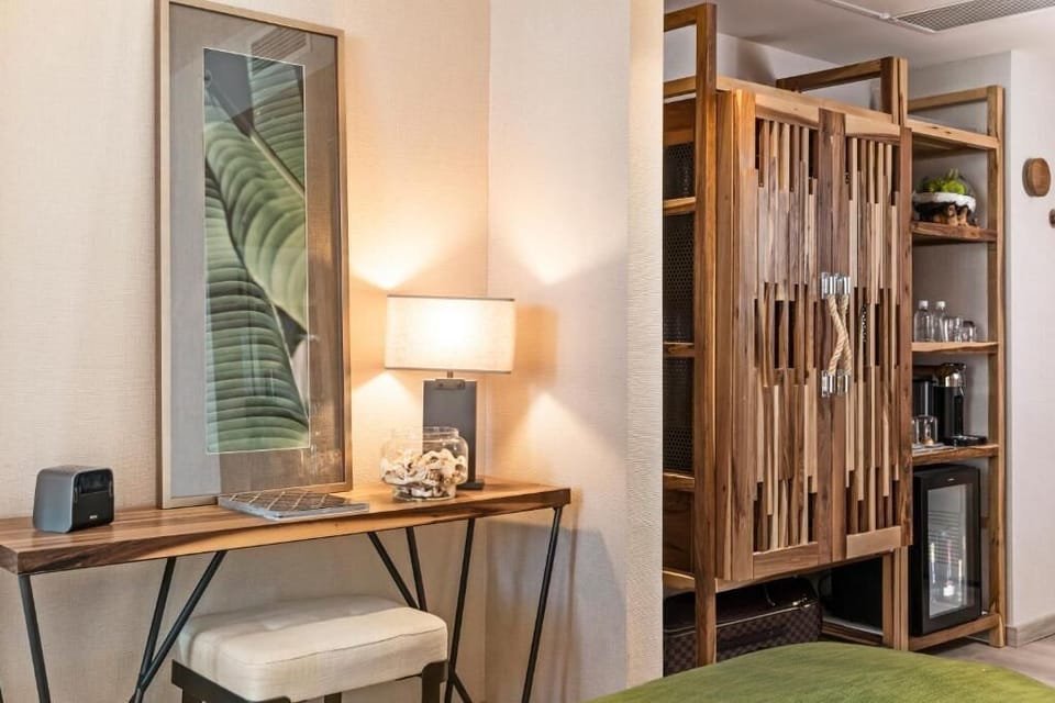 Settle in with a cozy desk and convenient in-room refreshments.