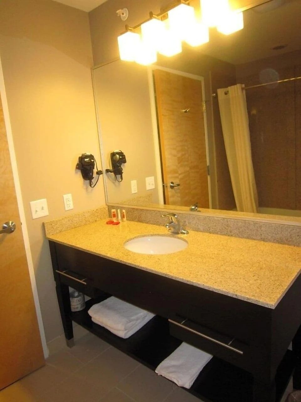 Refresh at the spacious vanity with bright, flattering lighting.