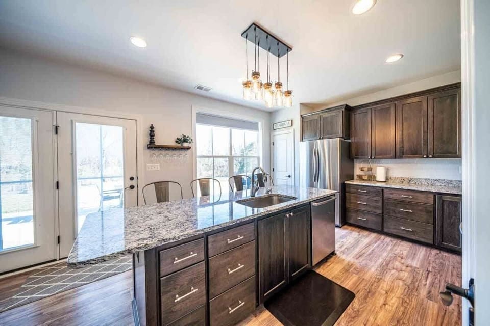 Kitchen with seating for 4 at the island and 4 at the bar, total of 8 