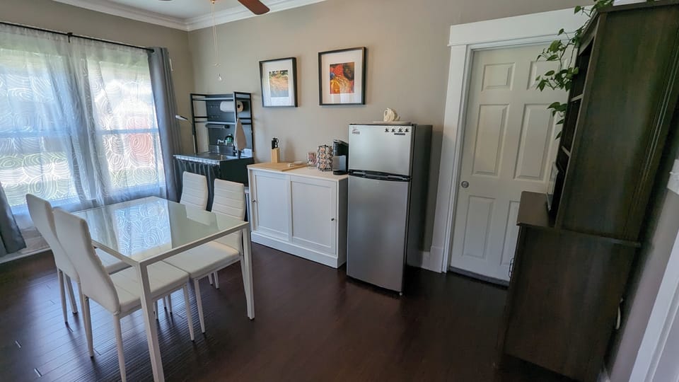 Kitchenette includes fridge, coffee maker, microwave, 10-in-1 oven.  