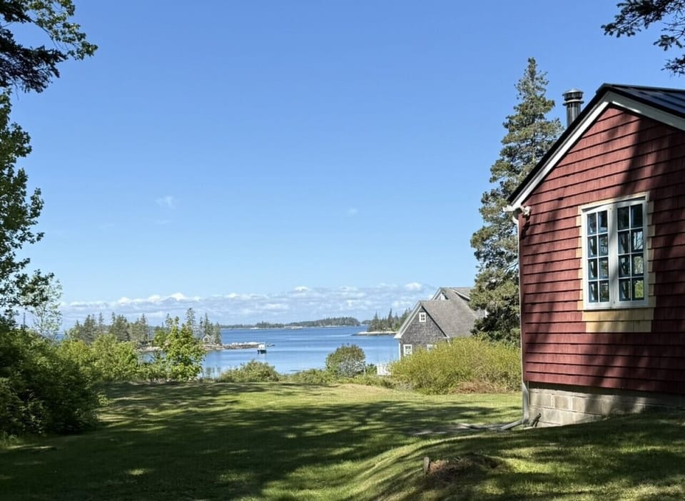 Large yard with a water view