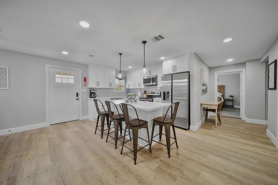 Enjoy the convenience of a full kitchen, complete with a 4-seater island. Whether you`re preparing a quick snack or cooking a gourmet meal, this well-equipped space ensures you have everything you need for a comfortable stay.