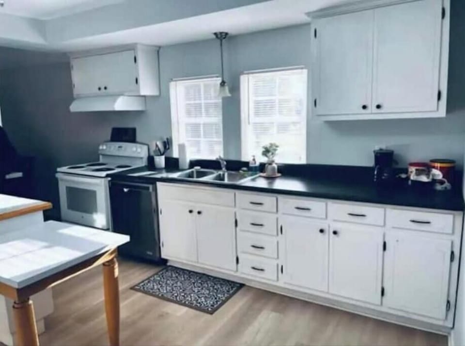 Full kitchen with cooking supplies 