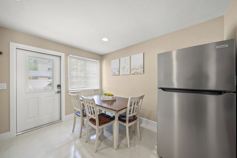 The beautiful dining table is the perfect spot to serve your delicious meals. 