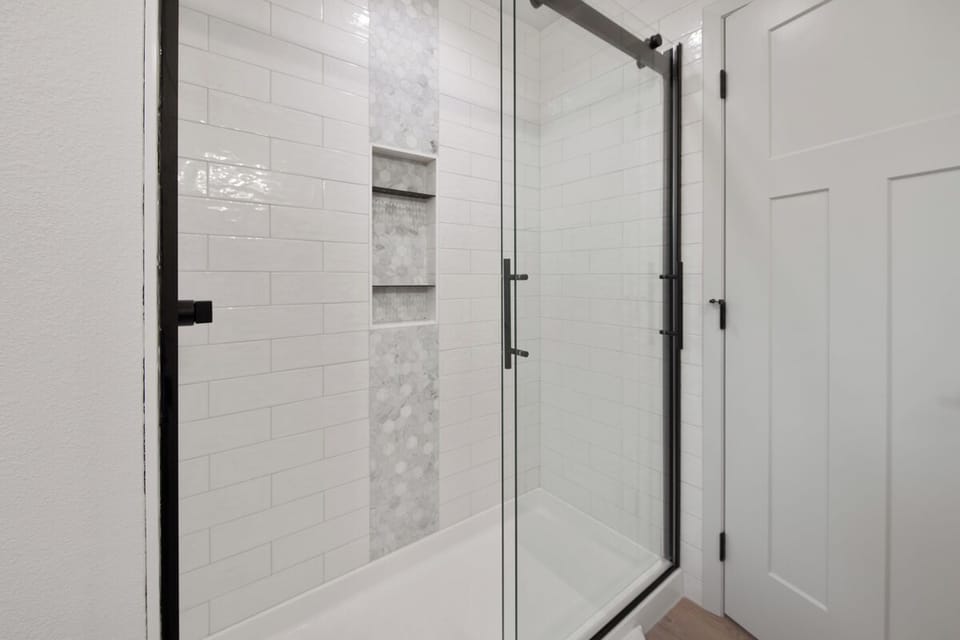 Beautiful tiled sower with glass doors