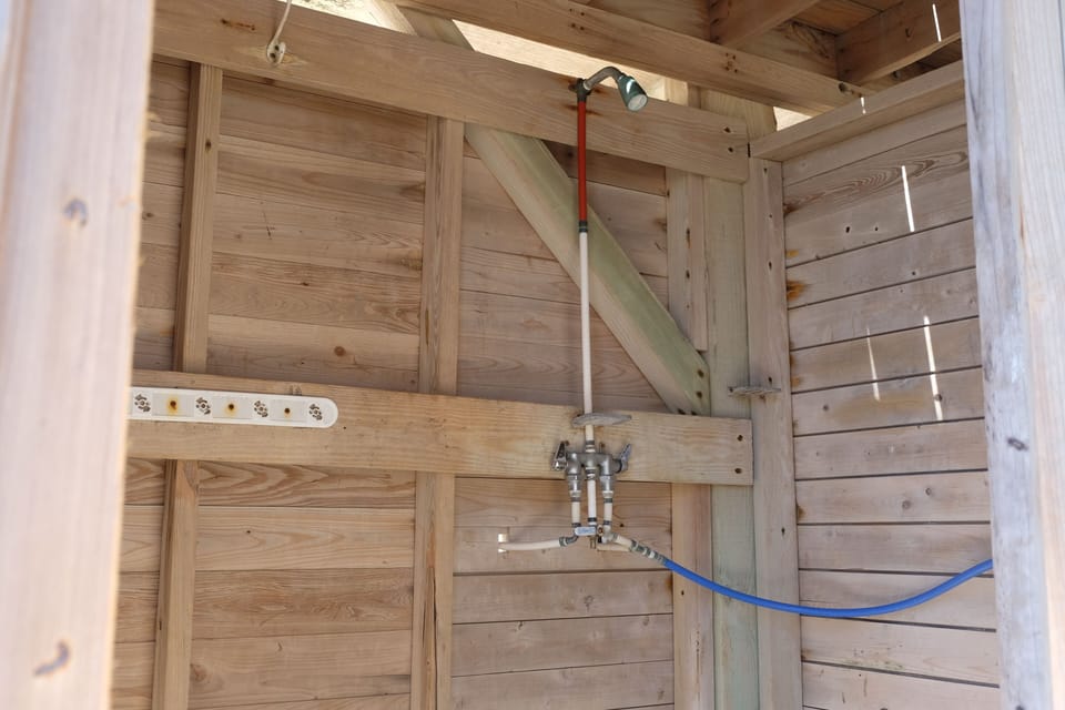 Outdoor shower at the bottom of the cottage.