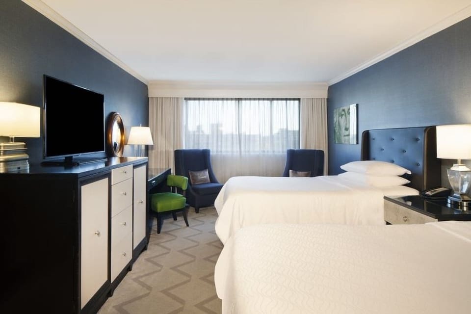 Settle in comfortably with two plush beds and calm lighting.